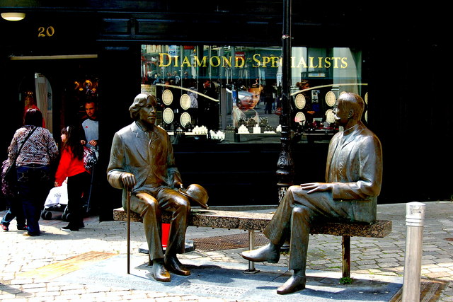 Galway - William Street - Two statues on a bench