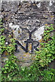 Benchmark on Burton Bridge over Walden Beck