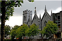 M2925 : Galway - River Corrib Walk - Church with Tower by Joseph Mischyshyn