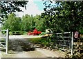 Farm machinery in clearing, Brede