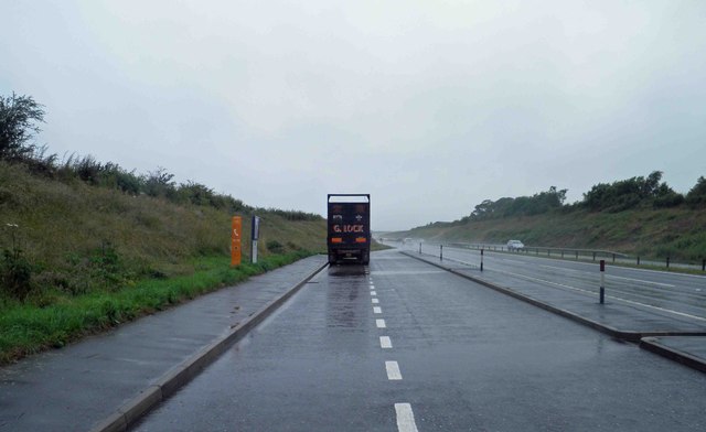 A wet lay-by on the A55 near Star