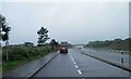 SH4772 : Road tanker parked in A55 lay-by by Steve  Fareham