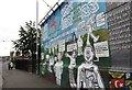 Tourist promoting mural at the Divis Tower power plant