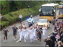 SZ0894 : Ensbury Park: the Olympic torch arrives by Chris Downer