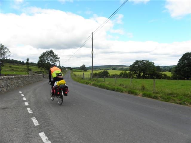A passing cyclist, Gortnagross, County Tyrone