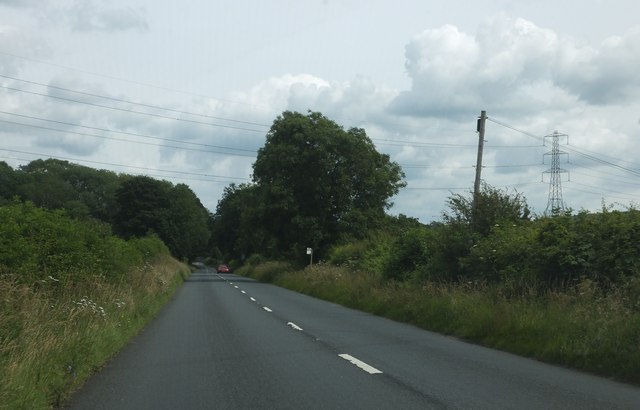 The A435 passing under power lines