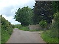 Wall and road at Meadow Lodge