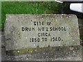 H5517 : Inscribed stone, Drum former school by Kenneth  Allen