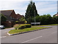 Grass triangle road junction in Gravehurst