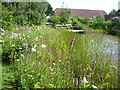 The pond and barn at Tyland Barn