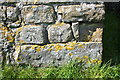 Benchmark on barn beside A684