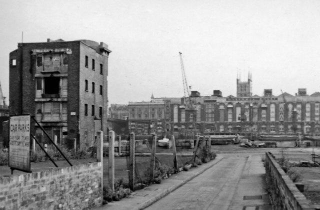 Near waterfront at Old Swan Wharf, looking across to Southwark bank and Cathedral, 1957