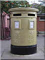 SJ3350 : Gold painted post box in Town Hill, Wrexham by John S Turner