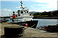 M2208 : The Burren - Ballyvaghan - Harbour Pier - " Happy Hooker" Boat by Joseph Mischyshyn