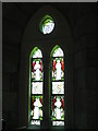 NY8773 : St. Mungo's Church, Simonburn - stained glass window by Mike Quinn