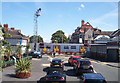 Merseyrail train passes over Birkdale level crossing