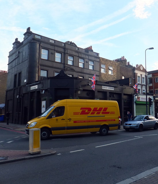 DHL Van passing Eagle London in Kennington Lane