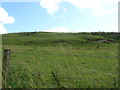 NT4224 : Hilly grazing ground by James Denham