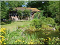 The pond and oast at Beech Court Gardens