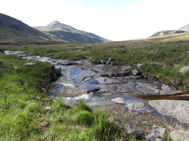 The rocky bed of the stream flowing from Binnian Lough