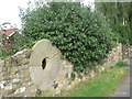 Millstone in a wall, Chapel Lane, Sykehouse