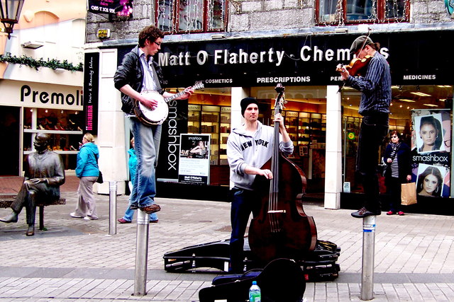 Galway - William Street - Three Musicians (Two Standing on Posts) 