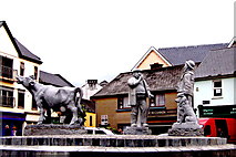 R3377 : Ennis - Market Place - Cow, Buyer & Seller Monument-Hand Shake Seals the Deal by Suzanne Mischyshyn