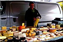 R3377 : Ennis - Market Place - Varieties of Cheese for Sale at Farmers' Market by Suzanne Mischyshyn