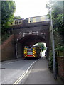 Fire Engine passing under Bridge, Alresford, Hampshire