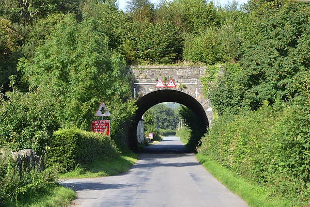 Road approaching railway bridge in Llanbrynmair