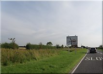 TA0153 : Approaching  a  road  junction  on  the  A164 by Martin Dawes