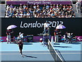 TQ3785 : Sitting under purple umbrellas, Olympic Park by David Anstiss