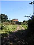 TM3775 : House entrance off the B1117 Halesworth Road by Geographer