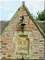 School bell and datestone on the Old Schoolhouse, Langar