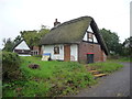 Small thatched cottage on Wellington Road near Church Aston