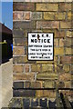 Old sign on the front wall of Broomfleet schoolhouse