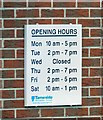SJ9596 : Opening Hours at Newton Library by Gerald England