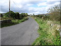 J1409 : The road north of the junction at Ballygoley by Eric Jones