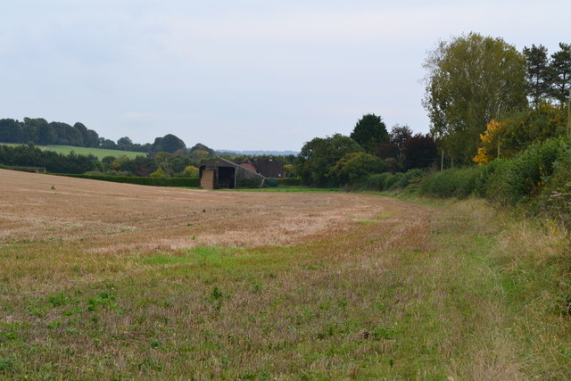 View across field towards Woodgate Farmhouse