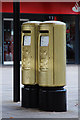 SP8539 : Greg Rutherford's Gold Post Boxes, Silbury Boulevard by Oast House Archive