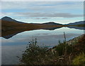 NH2961 : A very calm Loch a' Chuillin by Dave Fergusson