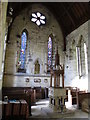 NY7756 : Holy Trinity Church, Whitfield - west end and font by Mike Quinn