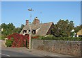 Pantiles, creeper and curly lamp standard