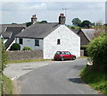 Red mini and whitewashed house, Mynydd-bach