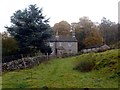 SK2579 : Former turnpike road at Longshaw by Graham Hogg