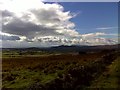 Dry stone wall and moorland under big skies