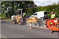 Cutting a trench in Campion Way