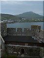 Castlebay: castle chapel and village view