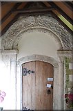 TR1032 : Norman Door with Grotesque, Burmarsh Church by Julian P Guffogg