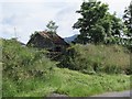 A tin roofed animal shelter on the north side of Livins Road